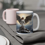 Front of mug with angel standing on a mountain