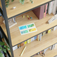 Small Holographic Love and Appreciation | Masaru Emoto | Sticker Sheets on a bookshelf 