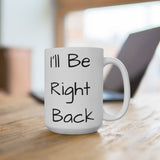I'll Be Right Back Ceramic Mug Right View  in the office with a laptop
