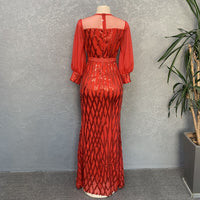 Back of African Fashion Sequin Dress for Plus Size Elegance on a Mannequin in Red