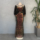 African Fashion Sequin Dress for Plus Size Elegance on a mannequin in Black
