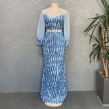African Fashion Sequin Dress for Plus Size Elegance on a Mannequin in Sky Blue